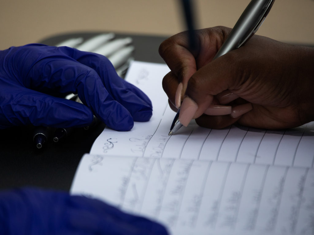 Signing the guest book to show you paid your respects meant something to plenty at the George Floyd memorial. (Photo by F. Carter Smith)