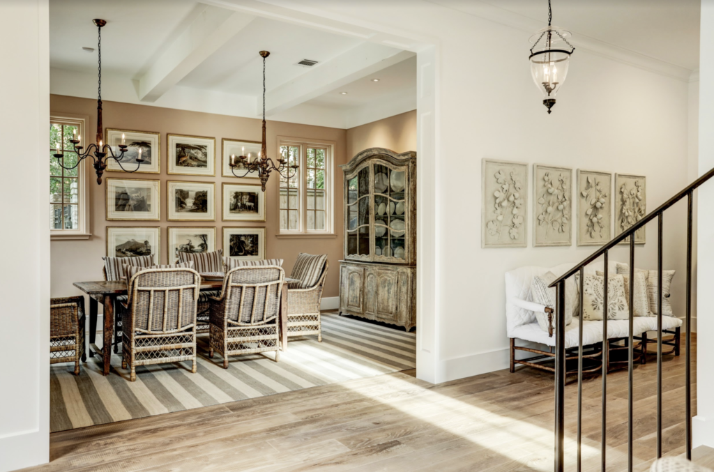To the left of the entry, the formal dining room, designed by Glasser Cooper, beckons.