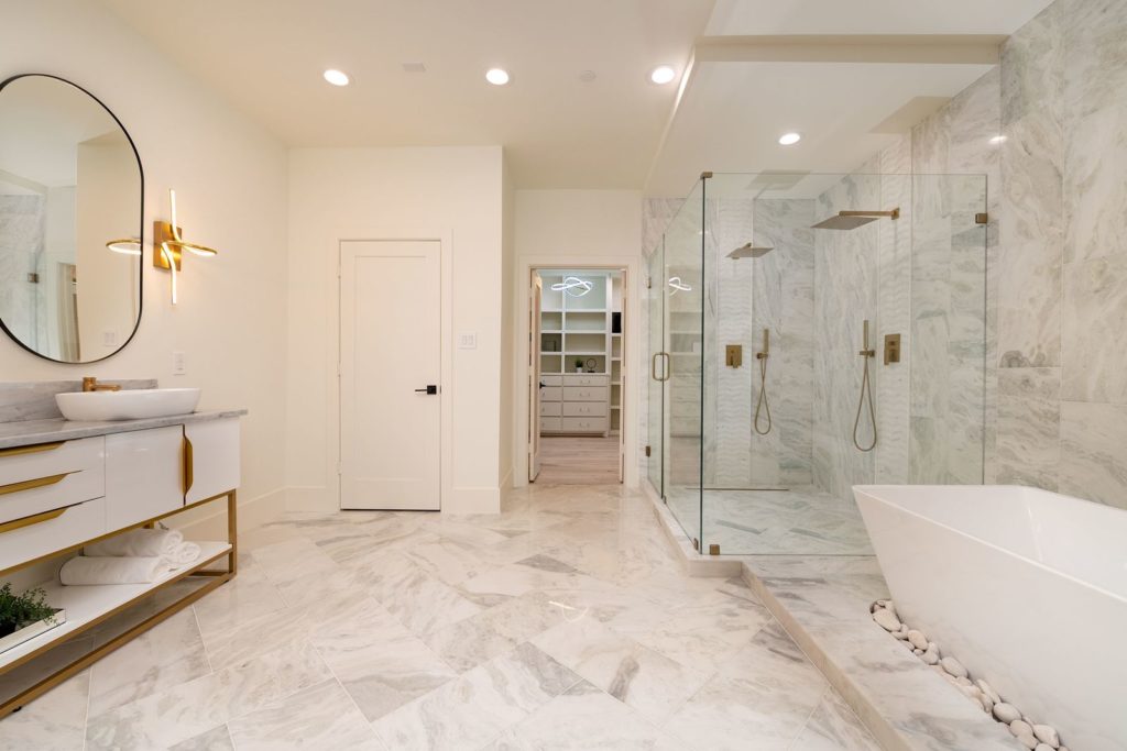 Primary ensuite spa bath and dressing.