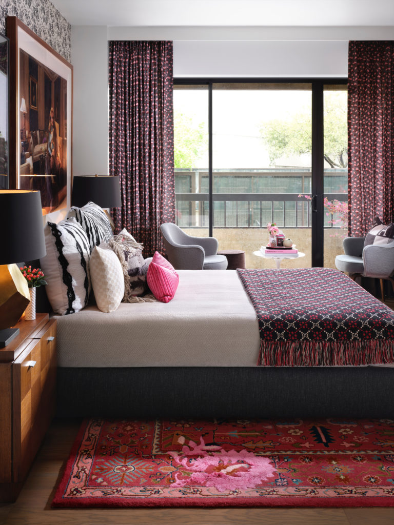  In the bedroom are Kelly Wearstler draperies, a rug from Anthropologie, and pillows from Forty Five Ten. (Photo by Lisa Petrole)