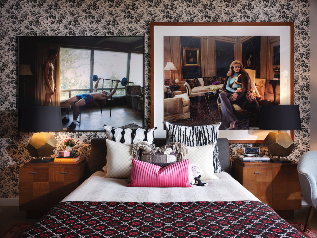 In this bedroom in a private home, Luke Smalley’s Exercise at Home, from Clamp Art, NYC. Steven Meisel’s Versace Pictures, acquired at auction. (Photo by Lisa Petrole)