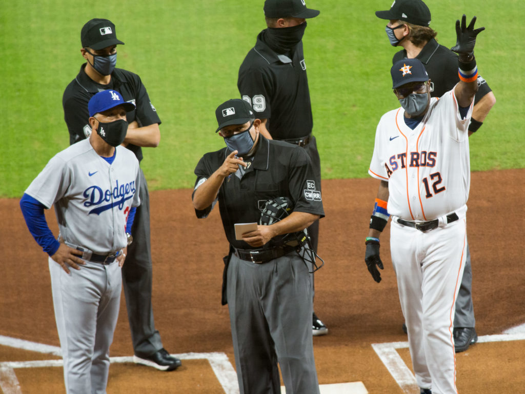 Dodgers manager Dave Roberts and Astros manager Dusty Baker have teams that are anything but fond of each other. (Photo by F. Carter Smith)