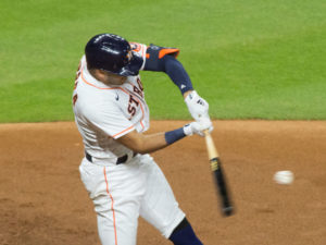 Carlos Correa connects on a homerun in the second inning against Los Angeles Dodgers pitcher Walker Buehler in a rematch of the 2017 World Series at Minute Maid Park