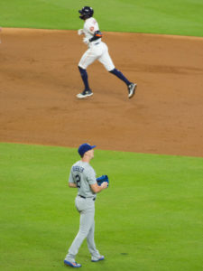 Carlos Correa connects on a homerun in the second inning against Los Angeles Dodgers pitcher Walker Buehler in a rematch of the 2017 World Series at Minute Maid Park