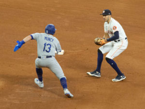 Carlos Correa makes the tag on DodgersÕ Max Muncy in the 7th inning.