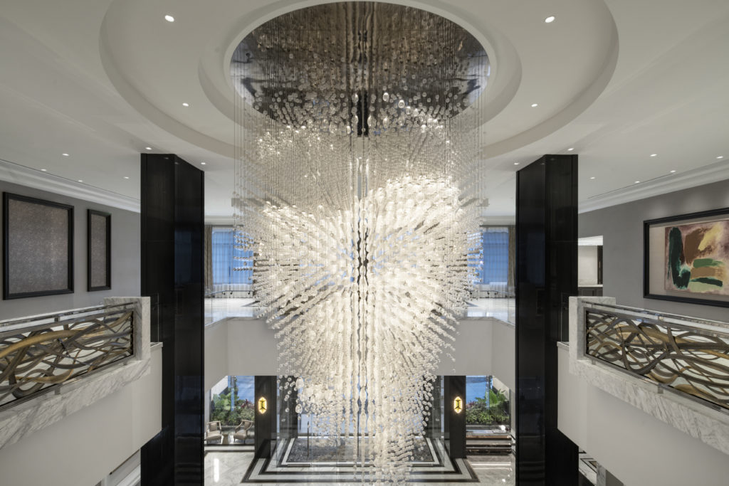 The million dollar Swarovski crystal chandelier lights the vast lobby of the Post Oak Hotel. (Photo Courtesy of Fertitta Entertainment)