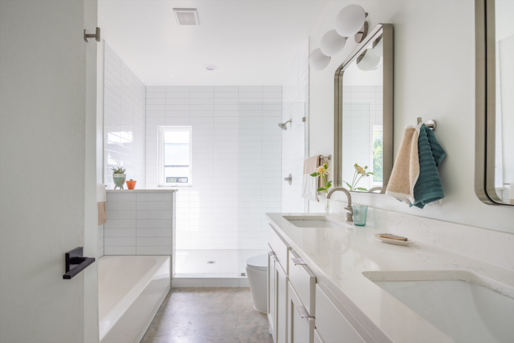 A bright master bathroom. 