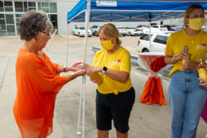 Hand sanitizing stations supplied by SUPA Skin Care (Photo by Gray Moore Photography)