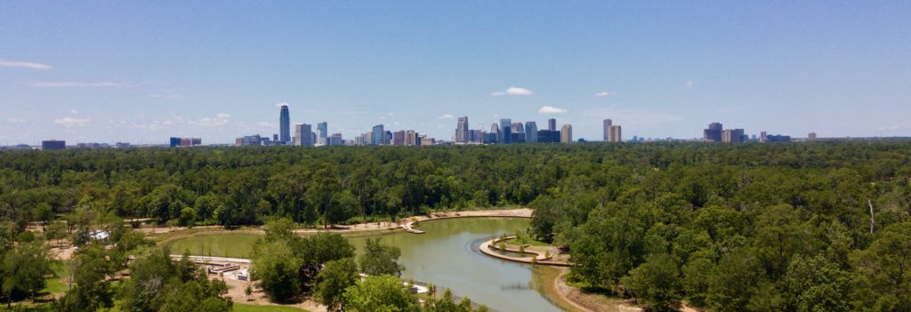 Uptown Houston can be seen in the distance from this perch high above Hines Lake in Memorial Park. (Photo by Memorial Park Conservancy)
