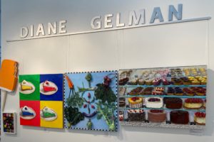 A wall of colorful Pop-inflected creations at Diane Gelman’s studio sited in The Silos at Sawyer Yards complex. (Photo courtesy the artist) 
