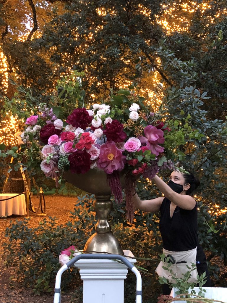 Sage 'n' Bloom designer Wendy Du puts finishing touches on an arrangement for a wedding at The Houstonian. (Courtesy photo)