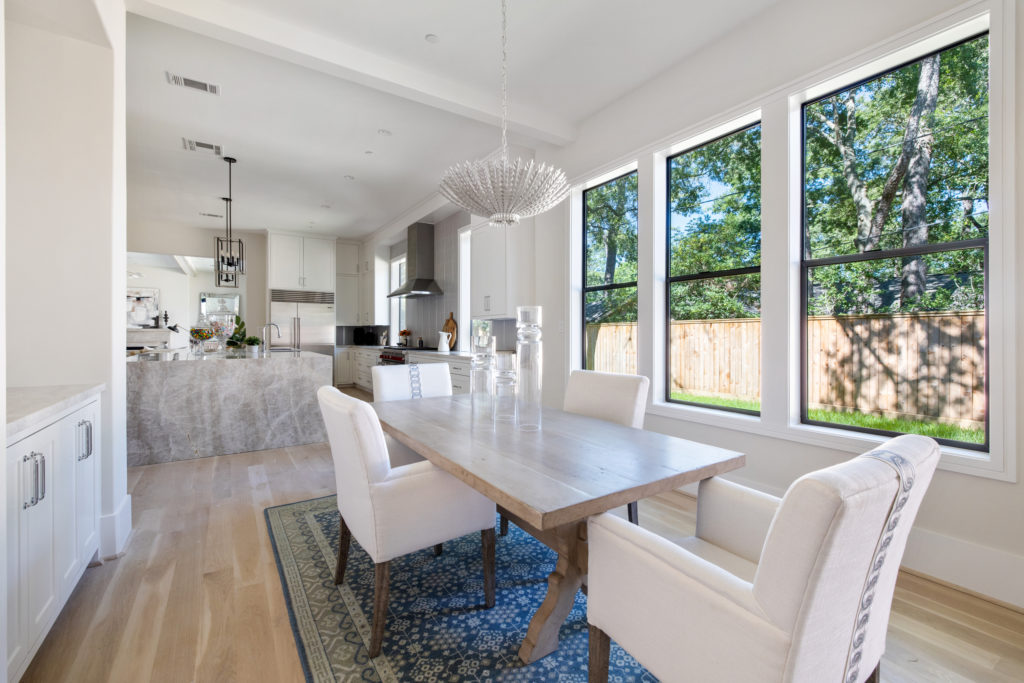 The breakfast room opens to the vast living area.