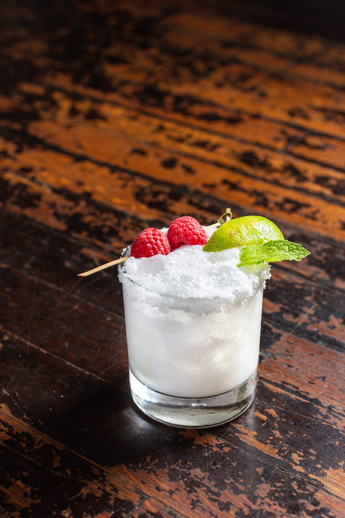 The frothy Composer cocktail at Lucille's is a sure winner for a sultry summer night. (Photo by Jenn Duncan)