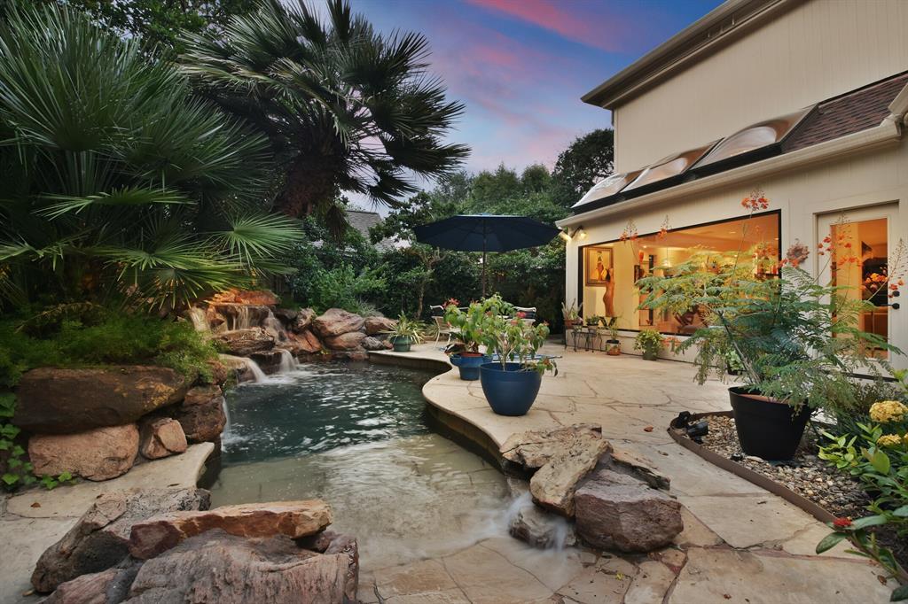 The backyard is all pool and patio perfect for entertaining.