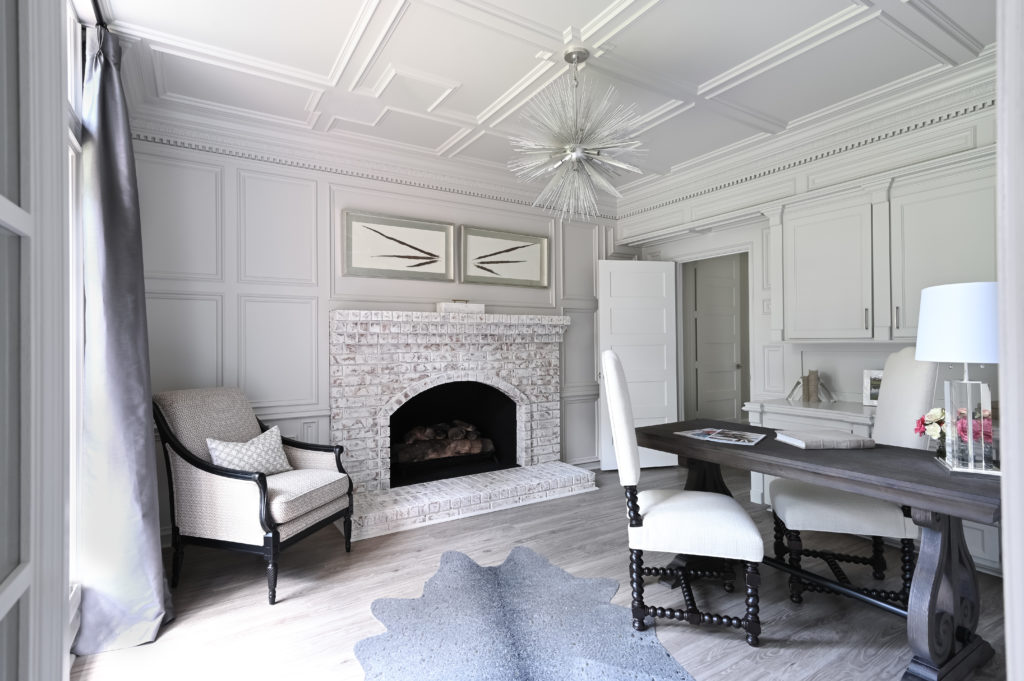 The fireplace is the focal point of the study which could double as an additional bedroom.
