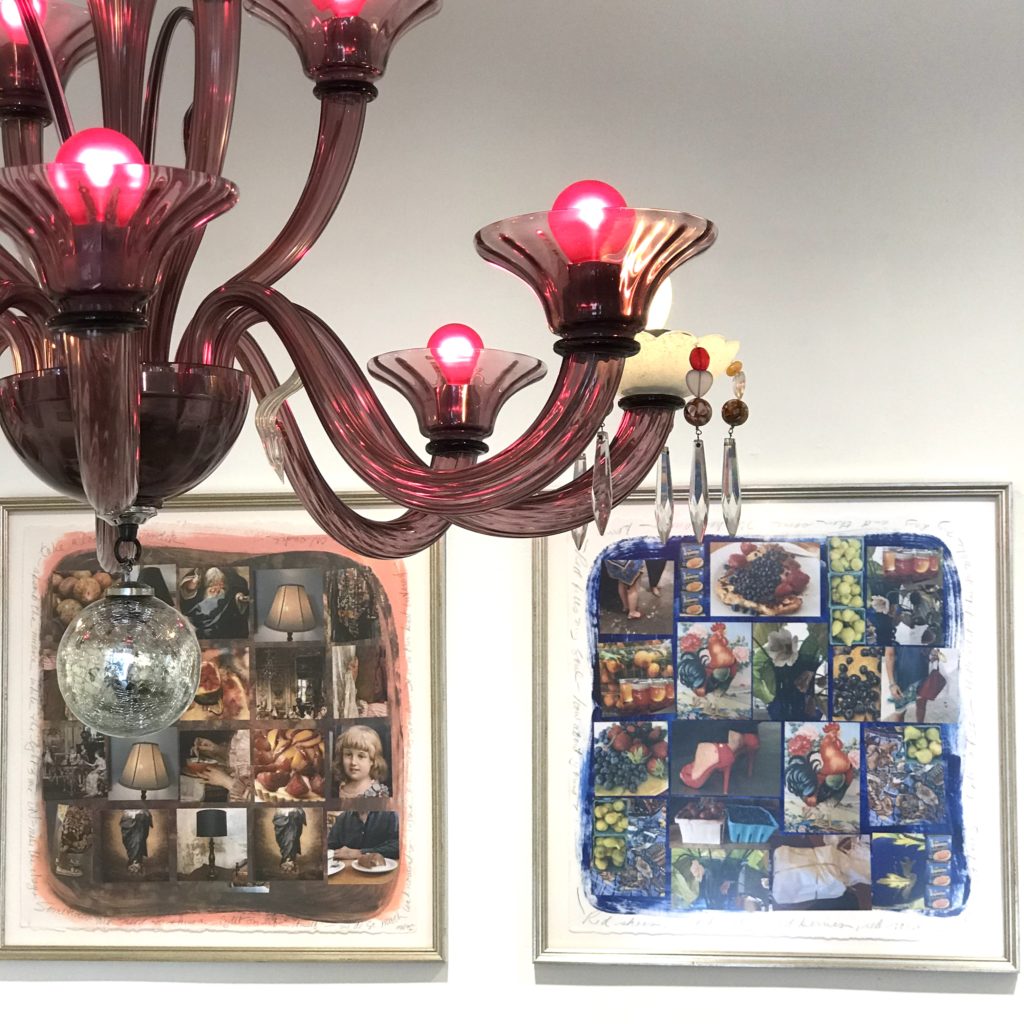"Confection," an artist-refurbished Murano glass chandelier embellished with a mash-up of disparate glass beads, drop crystals, and hot pink lightbulbs. On the wall behind, a pair of multimedia photo collages. (Photo by Mary Margaret Hansen)
