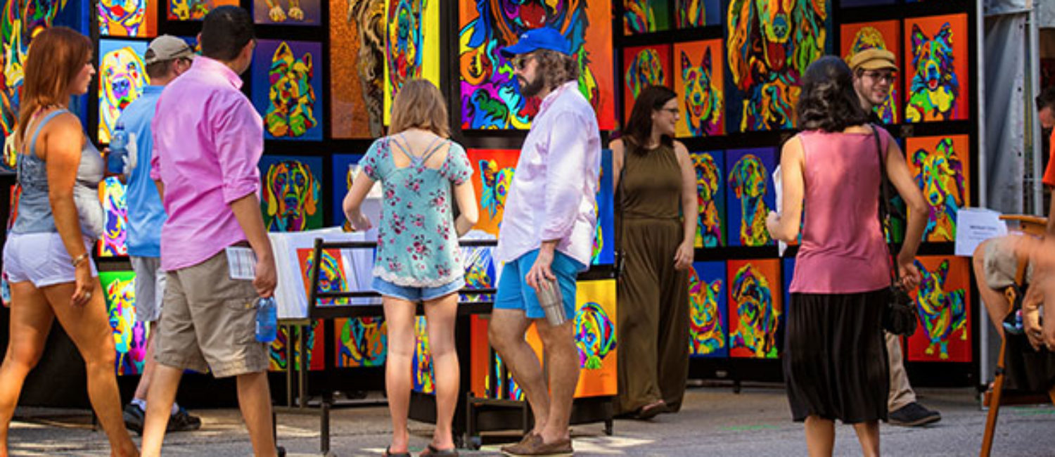 The colorful open air scene of the Bayou City Art Festival is a Houston tradition.
