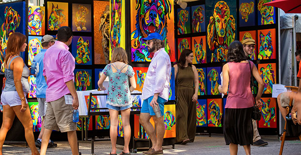 The colorful open air scene of the Bayou City Art Festival is a Houston tradition.
