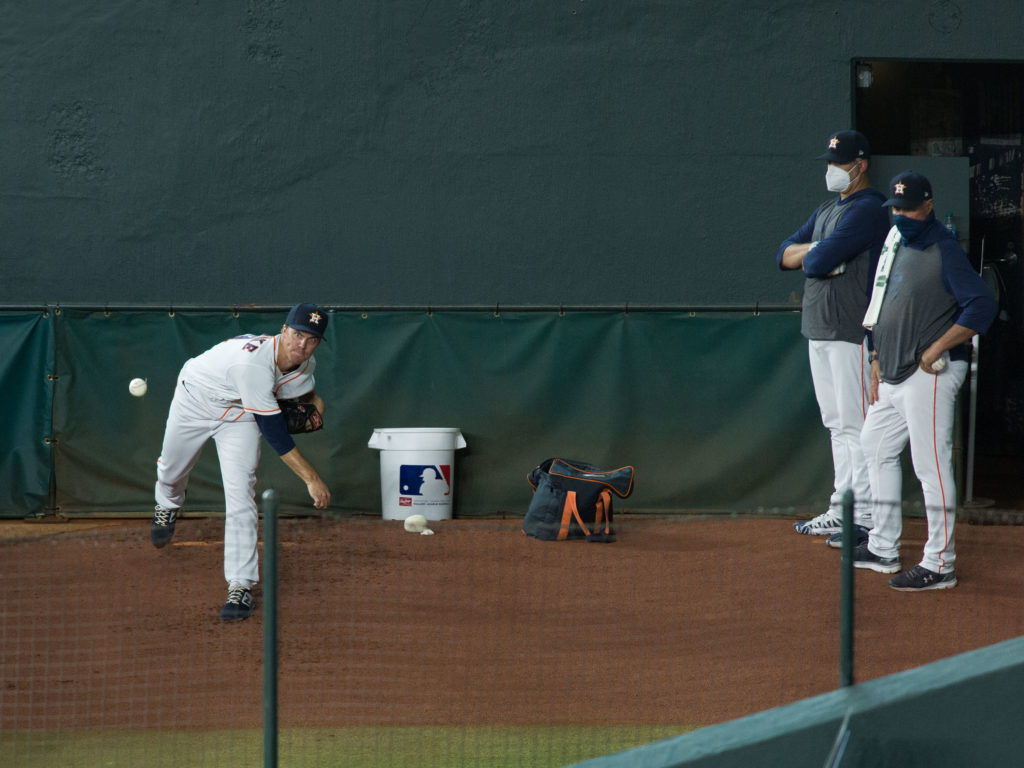 Zack Greinke warms up under watchable eyes. (Photo by F. Carter Smith)