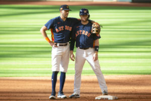 Carlos Correa puts his arm around Aledmys Diaz during pitching change at Minute Maid Park