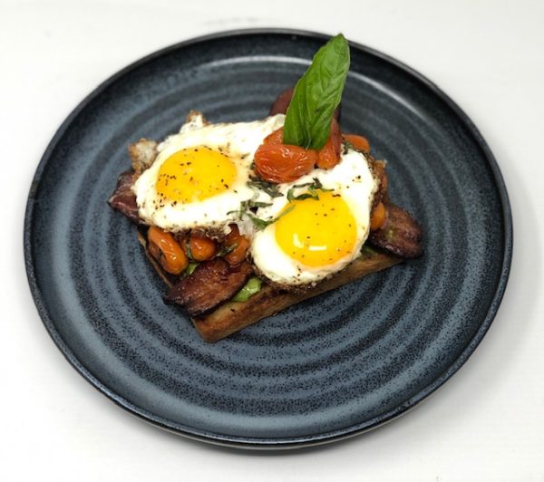 Avocado Texas Toast with TomatoBasil Confit, Slab Bacon, Sunny Eggs PaperCity Magazine