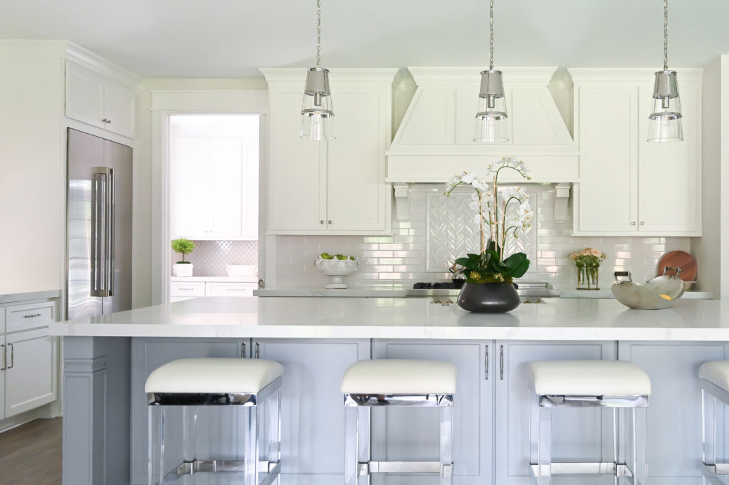 The bar stools in the kitchen come from the Chabonneau Studio Collection.