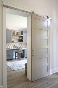 One of three rolling barn doors installed as part of the renovation.