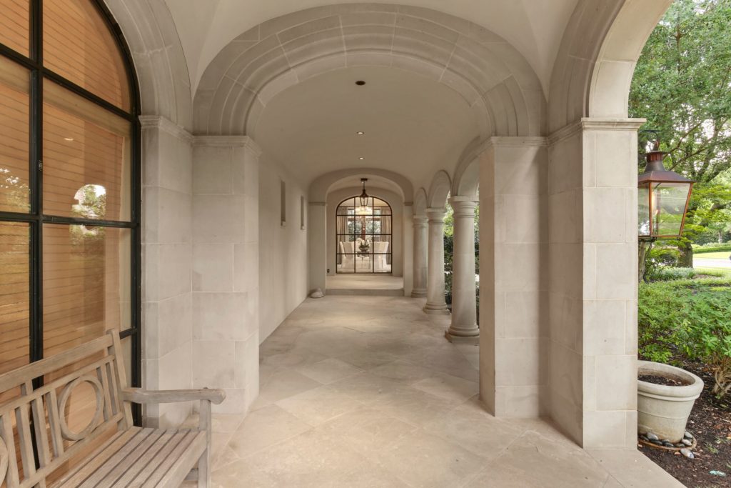 The expanse of archways leading to the front entrance.