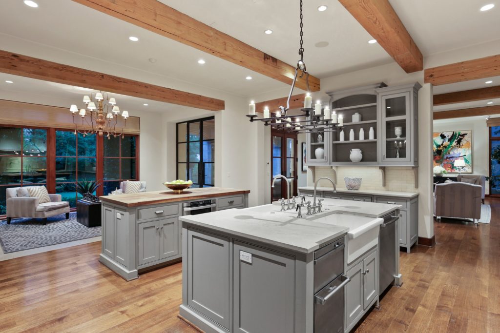 Kitchen is open to the sitting room beyond.