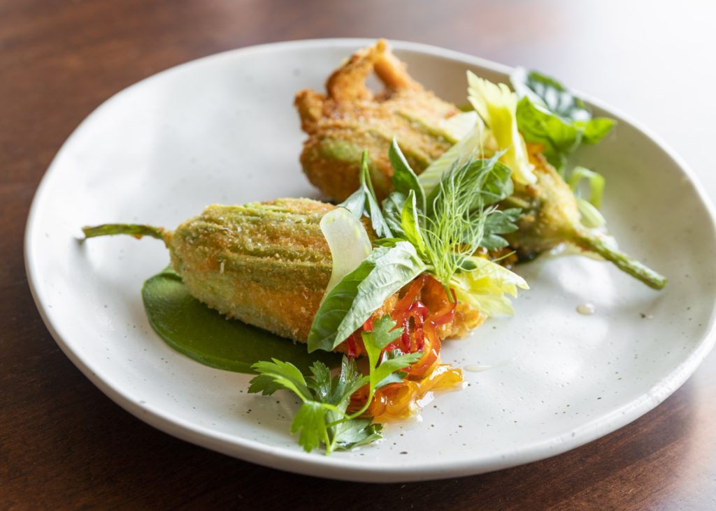 Victoria Bludorn's favorite dish from her husband's kitchen at Bludorn is the squash blossoms. (Photo by Julie Soefer)