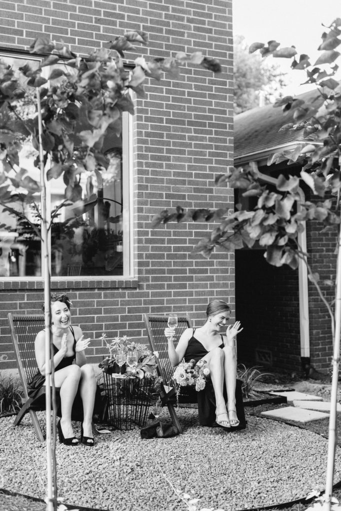 Bridal party quafs cocktails in the front garden. (Photo by Mustard Seed Photography)