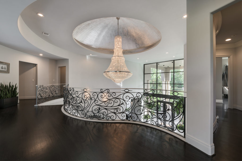 The $60,000 crystal chandelier from Egypt is one of several showstopping elements in the vast mansion.