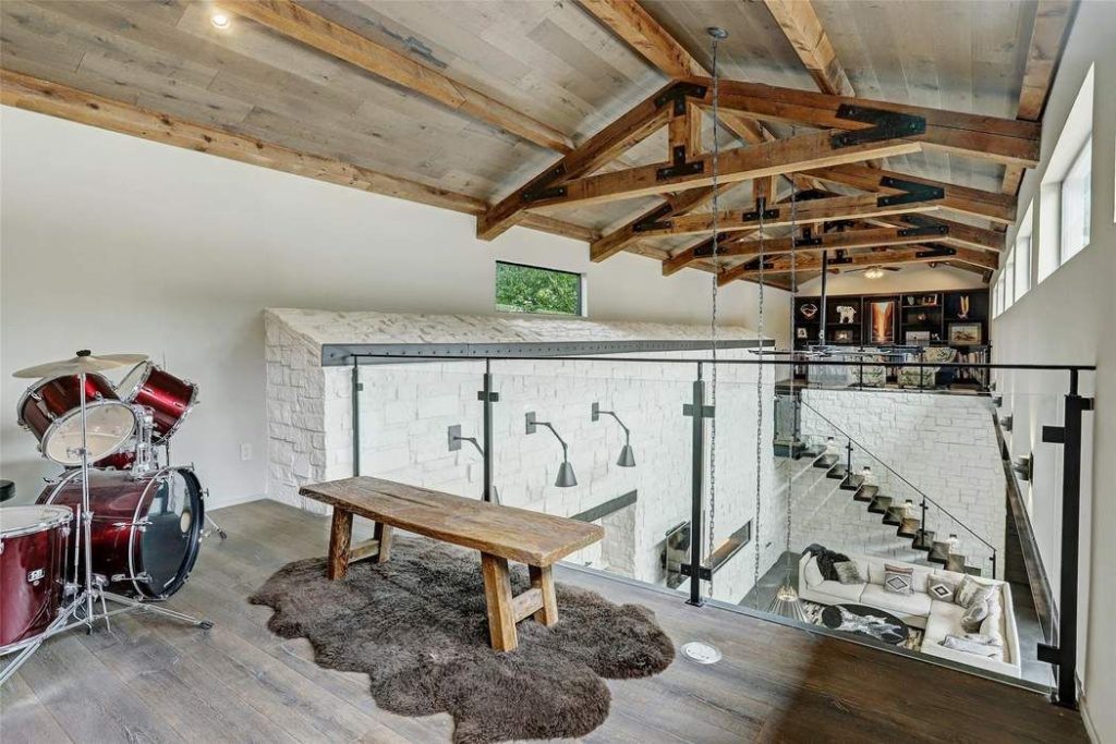 A view from the 16' x 10' lounge shows the beauty of the exposed framing members of the vaulted ceiling.