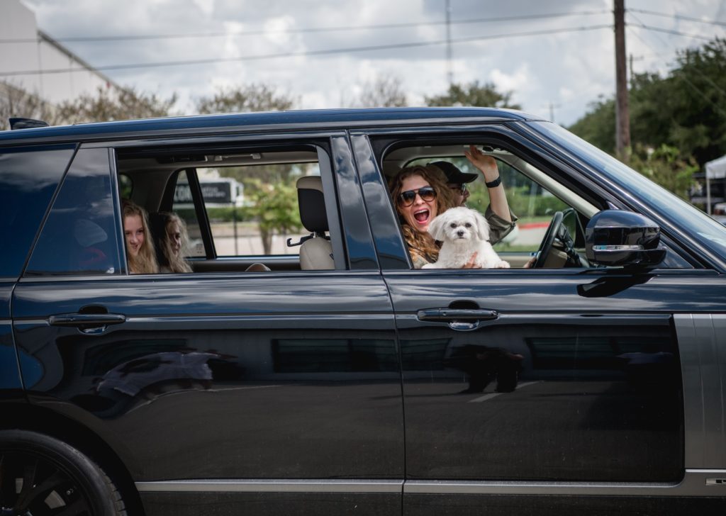 Even the family dog joins the Alice in Wonderland drive-through outing. (Photo by  Brandy Stoesz Photography)