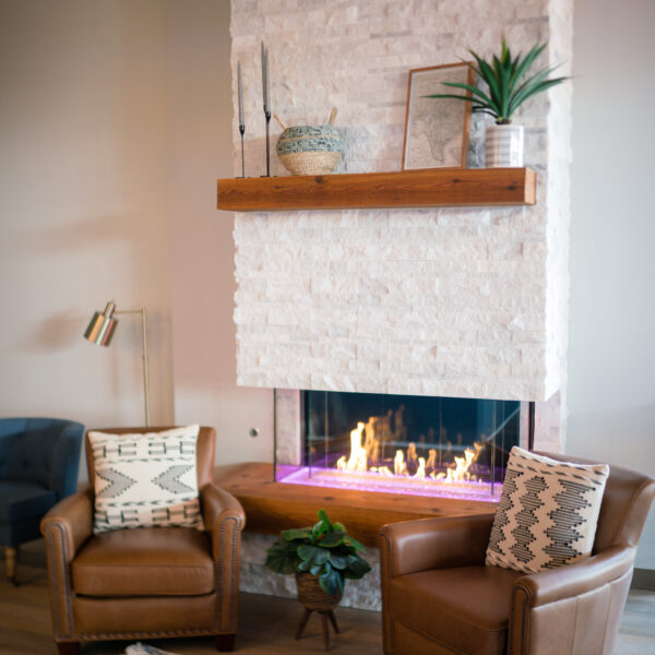The inviting fireplace. Photo by Lacy Lane.