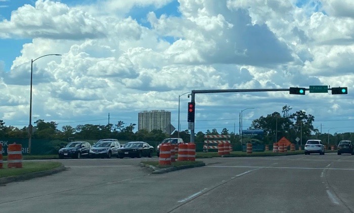 Once hidden by Memorial Park trees, high rises and utility wires are now on the horizon and will hopefully disappear behind the land bridges. (Photo by Shelby Hodge)