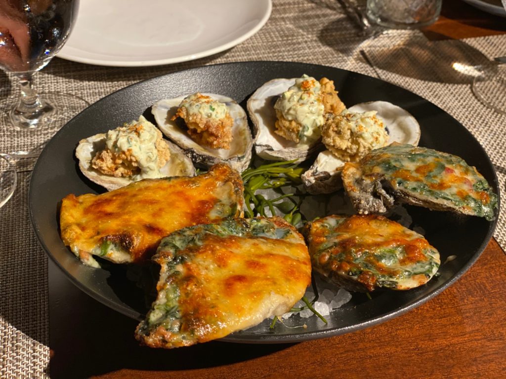 A duo of oyster appetizers, baked and fried (Photo by Shelby Hodge)