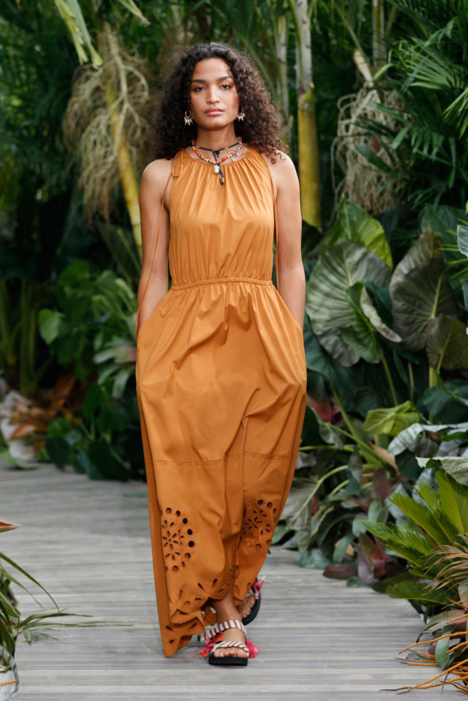 "Pose" star Indya Moore led off the Jason Wu fashion show in an orange long dress with eyelet cutouts at the hemline. (Photo courtesy of Jason Wu)