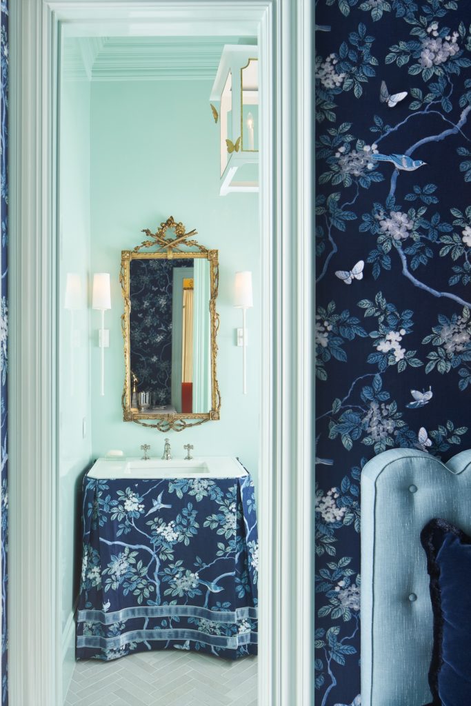 Back powder room and vestibule designed by Traci Zeller Interiors. (Photo by Stephen Karlisch)
