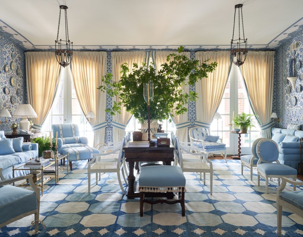 The living room of Mark Sikes' Kips Bay Decorator Show House Dallas is inspired by the iconic Villa Fiorentina in Saint-Jean-Cap-Ferrat, decorated by Billy Baldwin. Window coverings The Shade Store. Center table from John Nelson Antiques, L.A.  (Photo Douglas Friedman) 