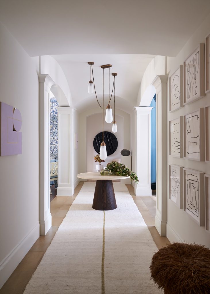 Gallery and powder room designed by M. Naeve. (Photo by Stephen Karlisch)