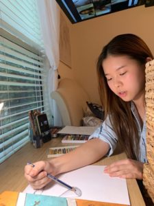 Lina Wu teaching virtual art lessons