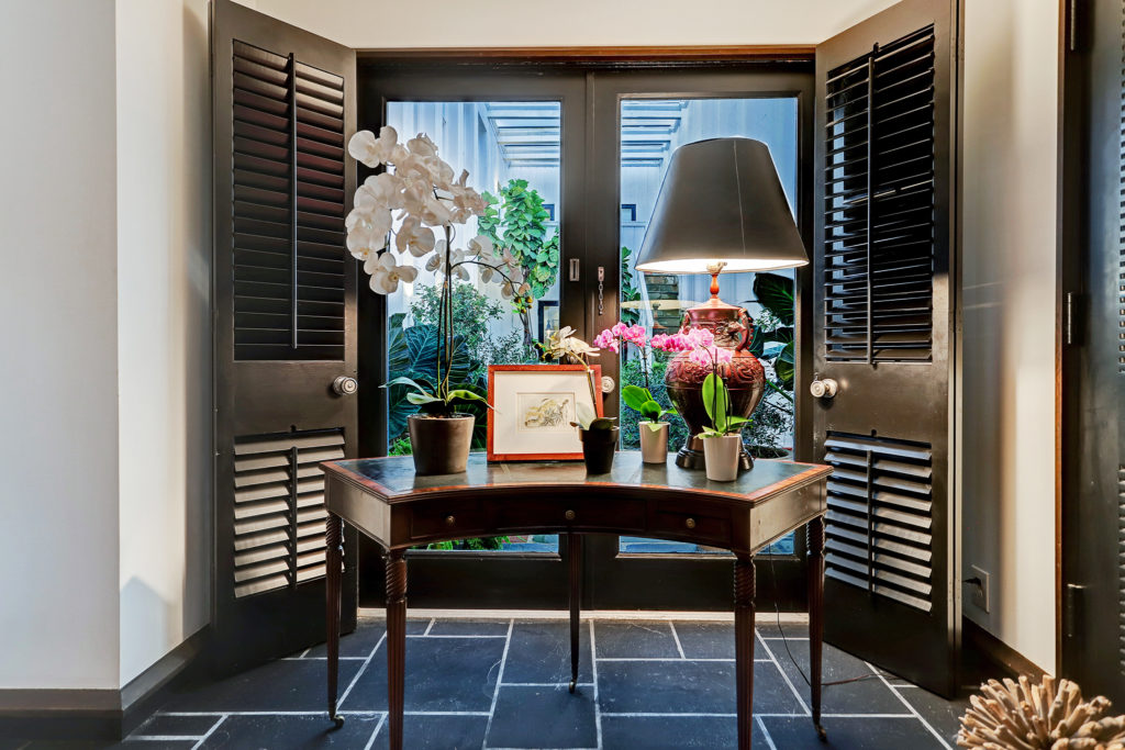 The entry from the front door reveals the  dual courtyards. (Photo by TK Images)