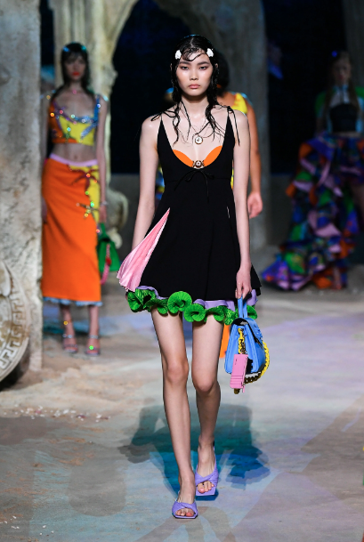 Houston model Sherry Shi walked the runway at the Versace show in black minidress with ruffled green hem. (Photo courtesy of Versace)