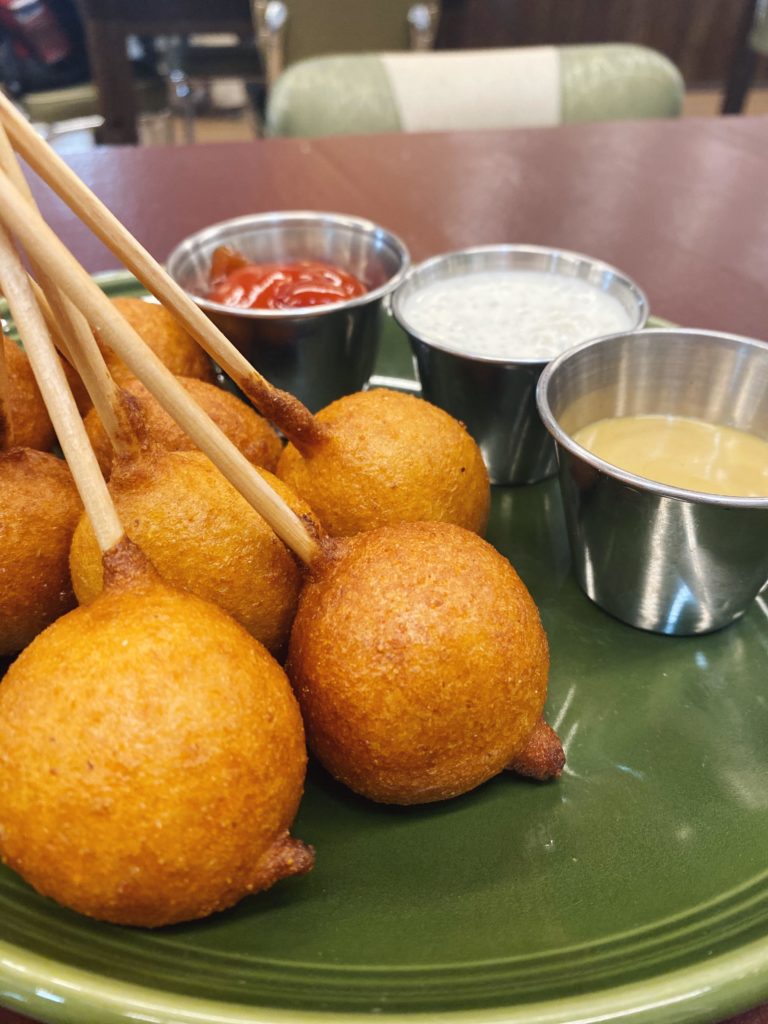 Shareable bites at Hurdy Gurdy range from corn dog pops to meatball wontons. (Courtesy of Hurdy Gurdy)