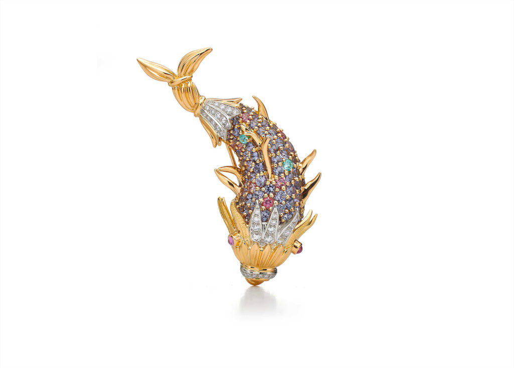 Tiffany & Co. Schlumberger® Royal Fish clip in 18k yellow gold and platinum with tsavorites, pink spinels, yellow and pink sapphires, and round brilliant diamonds. All prices upon request.
