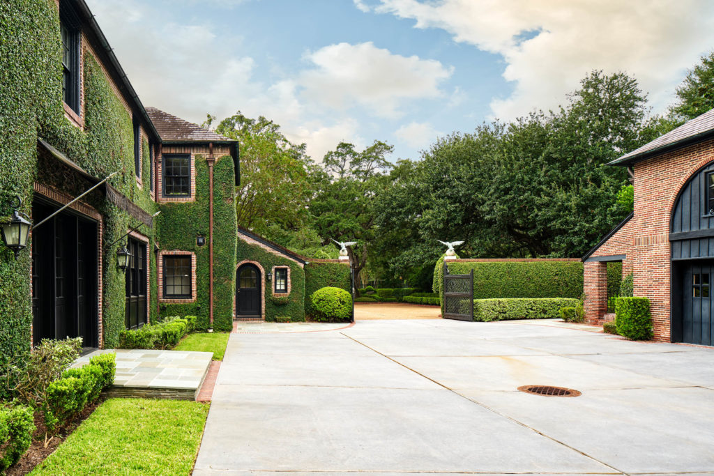 The three car garage at 2 Longfellow Lane is flanked by the coach house which has full quarters on the second floor. (Photo by Nathan Schroder/Douglas Elliman)
