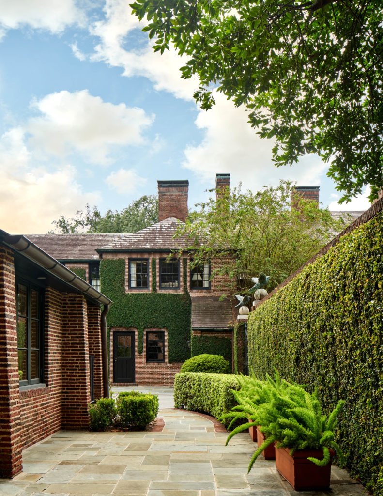 Behind the coach house at 2 Longfellow Lane is a gardener's break room and bathroom. (Photo by Nathan Schroder/Douglas Elliman)