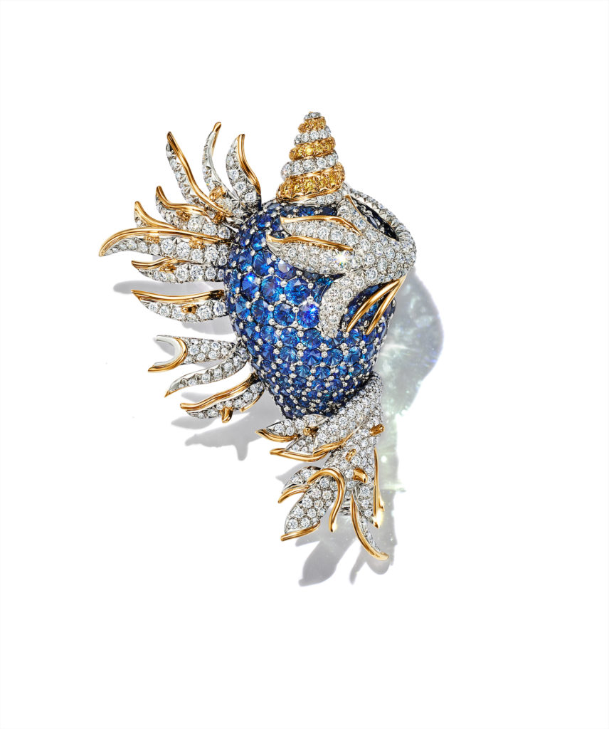 Tiffany & Co. Schlumberger® Coquillage clip in platinum and 18k yellow gold with round sapphires, over 28 total carats, round yellow and white diamonds, over 6 total carats.  Price upon request
