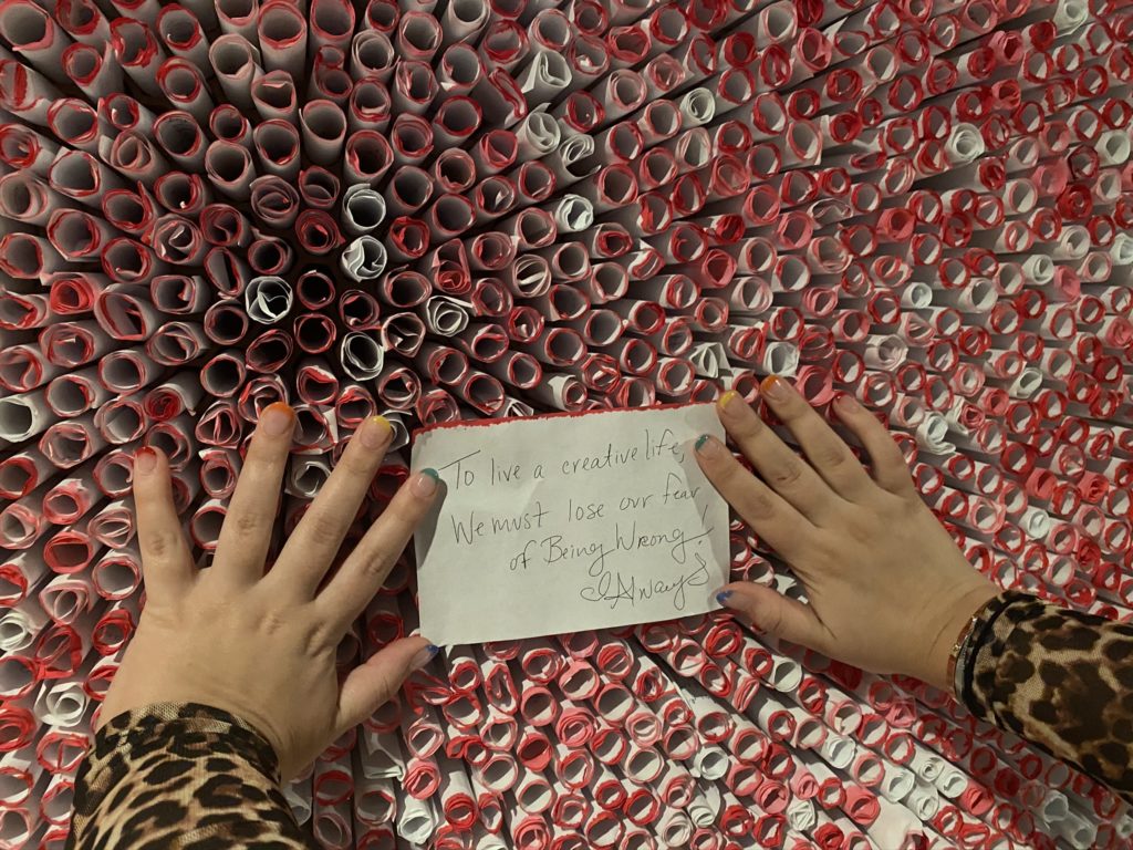 In Illegal Art's "The Last Word," visitors are encouraged to unwrap and read the messages, some of which are extremely moving. (Photo by Anna Votaw)